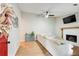 Bright living room features a white fireplace and light-colored flooring at 3076 Montheath Pass, Duluth, GA 30096