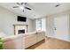 Spacious living room features a fireplace and plenty of natural light at 3076 Montheath Pass, Duluth, GA 30096