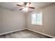 Bedroom featuring a ceiling fan, natural light from a large window and wood look flooring at 5577 Whittondale Rd, Lithonia, GA 30058