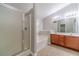 Bathroom features a shower, separate tub, and a double sink vanity at 1346 Upshur Pl, Buford, GA 30519