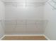 Walk-in closet features wire shelving, providing ample storage and organization space at 1346 Upshur Pl, Buford, GA 30519