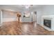 Spacious living room with hardwood floors and a fireplace at 1346 Upshur Pl, Buford, GA 30519