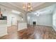 Open floor plan with dining area, living room, and access to the kitchen at 1346 Upshur Pl, Buford, GA 30519