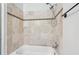 Bathroom featuring a tiled shower and tub combination at 1952 Winding Creek Sw Ln, Marietta, GA 30064