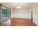 Spacious dining area with hardwood floors, wainscoting detail and access to screened porch at 1952 Winding Creek Sw Ln, Marietta, GA 30064
