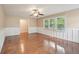 Bright living room with hardwood floors, neutral paint, and a large window providing natural light at 1952 Winding Creek Sw Ln, Marietta, GA 30064