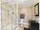 Beautiful bathroom featuring a stand up shower, toilet and a contemporary sink with modern finishes at 2851 Weatherstone Se Cir, Conyers, GA 30094
