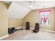 Large bonus room featuring carpet floors, neutral walls, a ceiling fan and natural light at 2851 Weatherstone Se Cir, Conyers, GA 30094
