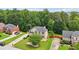 Attractive two-story home with manicured lawn, mature trees, and a spacious driveway at 2851 Weatherstone Se Cir, Conyers, GA 30094
