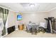 Finished basement with table, television and workout equipment at 2851 Weatherstone Se Cir, Conyers, GA 30094