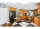 Spacious kitchen featuring custom cabinets, granite countertops, and an island at 2851 Weatherstone Se Cir, Conyers, GA 30094