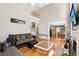 Spacious living room featuring hardwood floors, a fireplace, and an open floor plan at 2851 Weatherstone Se Cir, Conyers, GA 30094
