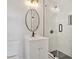 Modern bathroom featuring a tiled shower, black hardware, and contemporary vanity at 4477 Timber Ridge Dr, Douglasville, GA 30135