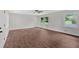 Bright bedroom with wood-look floors, a ceiling fan, and lots of natural light at 4477 Timber Ridge Dr, Douglasville, GA 30135