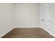 Bedroom features hardwood floors and a closet at 631 Skytop Dr, Cumming, GA 30040