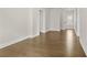 Hallway featuring hardwood floors and natural light at 631 Skytop Dr, Cumming, GA 30040