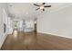 Open-concept living room and kitchen with hardwood floors and recessed lighting at 631 Skytop Dr, Cumming, GA 30040