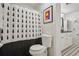 Well-lit bathroom featuring a shower-tub combo and contemporary fixtures at 2072 Castleway Ne Dr, Atlanta, GA 30345