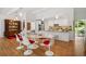 Dining room featuring a marble table and chairs with an adjacent modern kitchen at 2072 Castleway Ne Dr, Atlanta, GA 30345