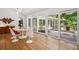 Dining room area featuring a modern table, chairs, and sliding glass doors to a deck at 2072 Castleway Ne Dr, Atlanta, GA 30345