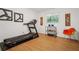 Exercise room with hardwood floors, a window, and a treadmill at 2072 Castleway Ne Dr, Atlanta, GA 30345