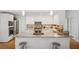 Contemporary kitchen with stainless steel appliances, white cabinetry, and a center island at 2072 Castleway Ne Dr, Atlanta, GA 30345