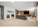 Bright living room with fireplace, modern decor, and neutral color palette at 2072 Castleway Ne Dr, Atlanta, GA 30345