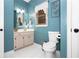 Well-lit powder room with stylish vanity and neutral-toned walls at 3785 Glen Ian Dr, Loganville, GA 30052
