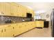 Spacious kitchen with granite countertops, stainless steel appliances, and ample storage at 3785 Glen Ian Dr, Loganville, GA 30052