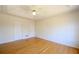 Bright bedroom with hardwood floors and two closets for ample storage at 1305 Bramlett Forest Trail Southeast Trl, Lawrenceville, GA 30045