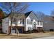 Beautiful two-story home featuring a brick-accented front, a well-maintained yard, and an attached two-car garage at 1305 Bramlett Forest Trail Southeast Trl, Lawrenceville, GA 30045