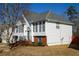 Lovely two-story house with a brick-lined foundation, complemented by neatly trimmed shrubs and a spacious yard at 1305 Bramlett Forest Trail Southeast Trl, Lawrenceville, GA 30045