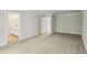 Spacious carpeted bedroom with an ensuite bathroom and abundant natural light at 241 Martin Spring, Lawrenceville, GA 30045