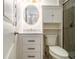 Nicely appointed full bathroom with a vanity, modern fixtures, and decorative mirror at 2983 Peek Nw Rd, Atlanta, GA 30318