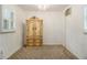 Bedroom featuring vintage wardrobe, neutral carpeting, and large window that brings in great light at 2983 Peek Nw Rd, Atlanta, GA 30318