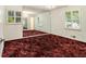 Spacious bedroom with lots of natural light and a decorative mirror at 2983 Peek Nw Rd, Atlanta, GA 30318