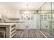 Bright kitchen features updated white cabinetry, stainless appliances, subway tile backsplash, and a pendant chandelier at 2983 Peek Nw Rd, Atlanta, GA 30318