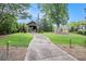 Beautiful backyard with a stone pathway leading to a luxurious outdoor gazebo at 3015 Southmoor Trce, Roswell, GA 30075