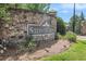 Stonegrove entrance featuring stone signage surrounded by lush landscaping, welcoming residents and visitors at 3015 Southmoor Trce, Roswell, GA 30075