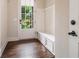 Convenient mudroom with built-in bench seating and storage, perfect for entry at 3015 Southmoor Trce, Roswell, GA 30075