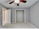 Bedroom with neutral paint, carpet, and closet at 4845 Dartford Dr, Powder Springs, GA 30127