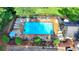 Aerial view of the community pool with lounge chairs and well-maintained grounds at 4845 Dartford Dr, Powder Springs, GA 30127