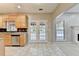 Kitchen with stainless steel appliances and view into carpeted living room at 4845 Dartford Dr, Powder Springs, GA 30127