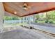 Spacious covered patio with brick flooring, offering an ideal outdoor living space at 4845 Dartford Dr, Powder Springs, GA 30127