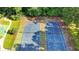 Aerial view of community tennis courts, perfect for recreational activities and sports at 4845 Dartford Dr, Powder Springs, GA 30127