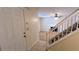 Welcoming entryway features a staircase, tile flooring, and a glimpse into the living area at 4927 Millstone Walk, Stone Mountain, GA 30088