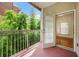 Balcony with an entry to the sun room and a peaceful view at 50 Biscayne Nw Dr # 2113, Atlanta, GA 30309