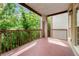 Relaxing covered outdoor balcony offering green, tree-lined views and privacy at 50 Biscayne Nw Dr # 2113, Atlanta, GA 30309