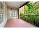 Balcony with railing offering a view of lush greenery at 50 Biscayne Nw Dr # 2113, Atlanta, GA 30309