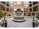 Beautiful courtyard with water feature and sitting area at 50 Biscayne Nw Dr # 2113, Atlanta, GA 30309